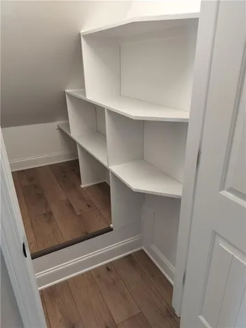 a view of an empty walk in closet