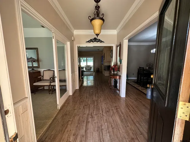 a very nice looking room with wooden floor