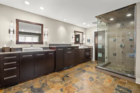 a kitchen with a sink and a refrigerator