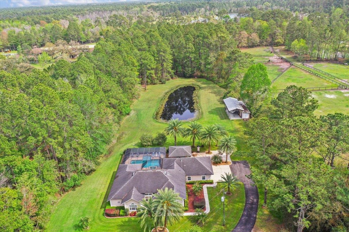 3180 B Pacetti Road St. Augustine, FL 32092 - Photo 1 of 42 an aerial view of a house with yard swimming pool and outdoor seating