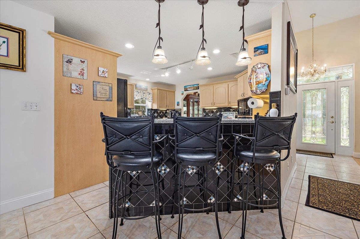 3180 B Pacetti Road St. Augustine, FL 32092 - Photo 15 of 42 a view of a dining room with furniture