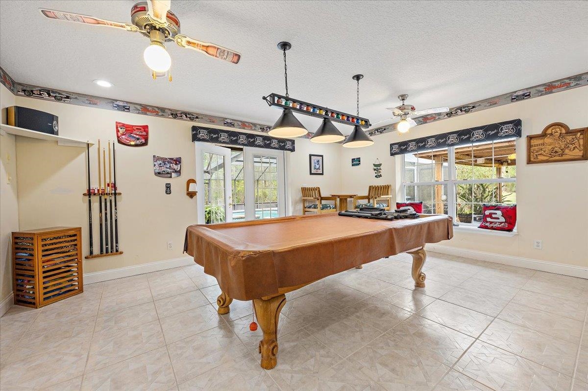 3180 B Pacetti Road St. Augustine, FL 32092 - Photo 20 of 42 a living room with furniture and a flat screen tv