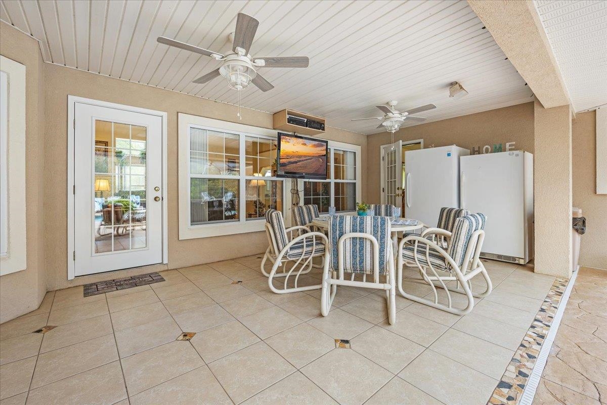 3180 B Pacetti Road St. Augustine, FL 32092 - Photo 21 of 42 a dining room with furniture and large windows
