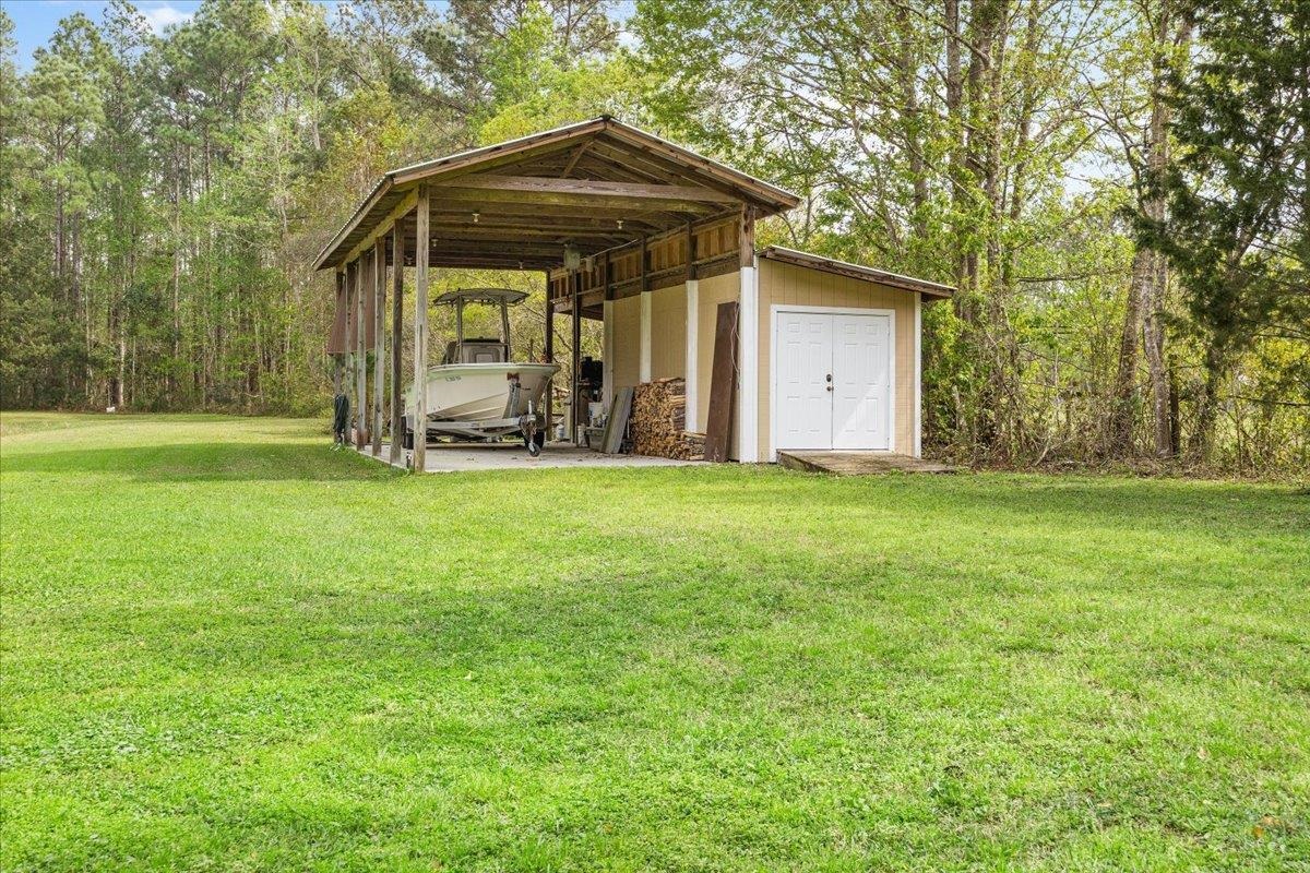 3180 B Pacetti Road St. Augustine, FL 32092 - Photo 26 of 42 a view of a house with a yard