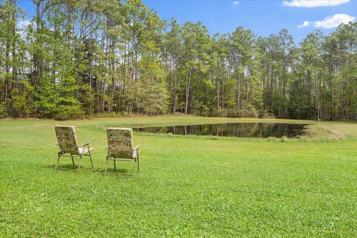 3180 B Pacetti Road St. Augustine, FL 32092 - Photo 27 of 42 a view of yard with swimming pool and outdoor seating