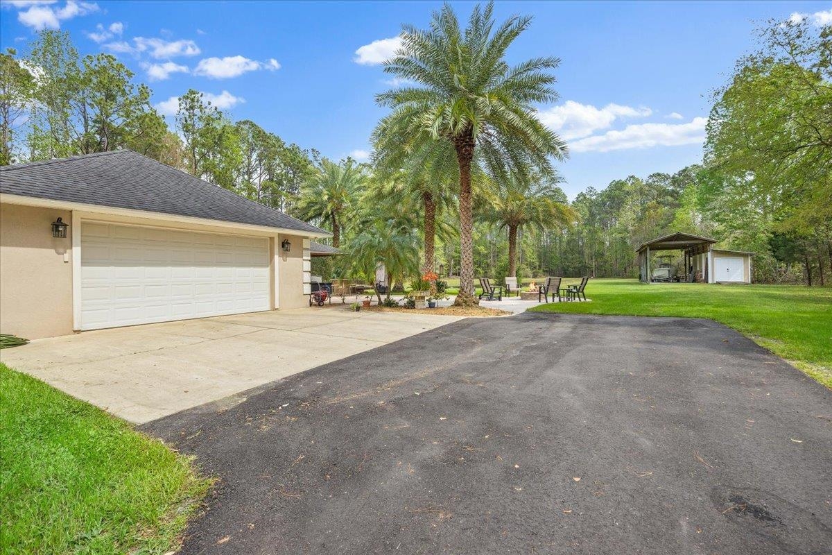 3180 B Pacetti Road St. Augustine, FL 32092 - Photo 28 of 42 a view of road and trees