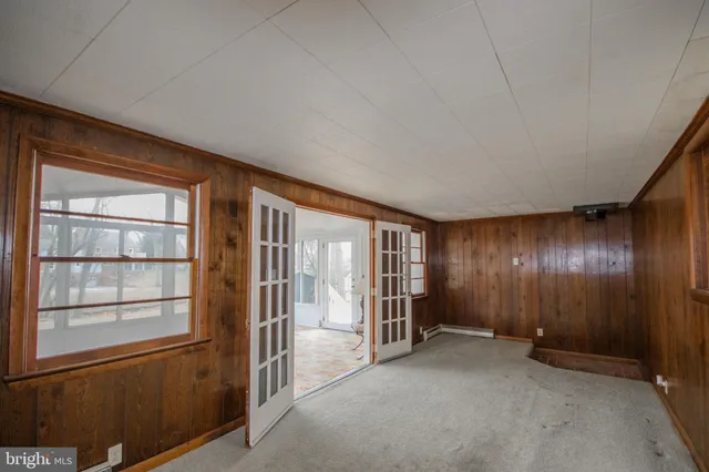 an empty room with windows