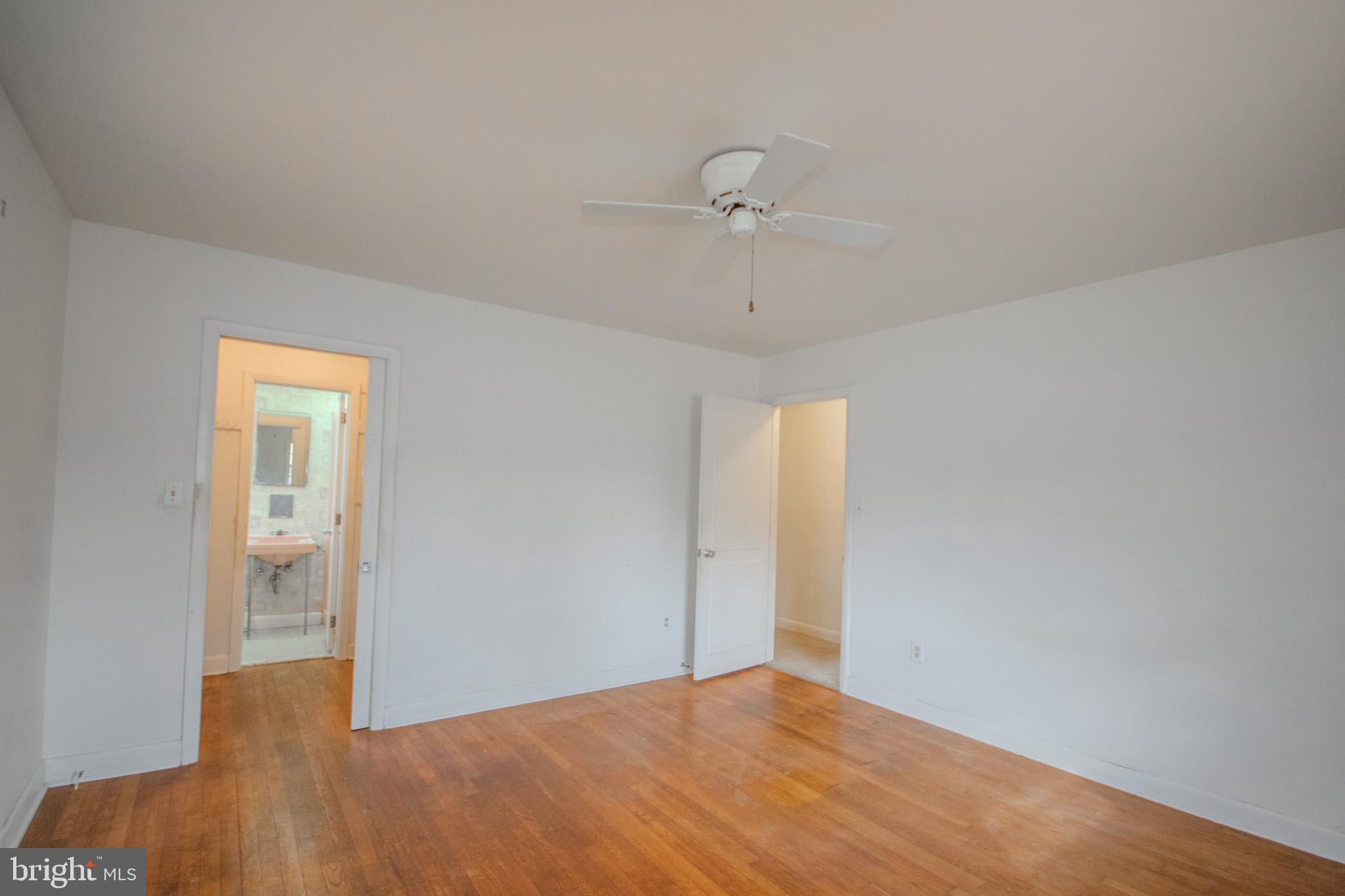 633 Ridge Road Salisbury, MD 21801 - Photo 21 of 45 a view of an empty room with a window