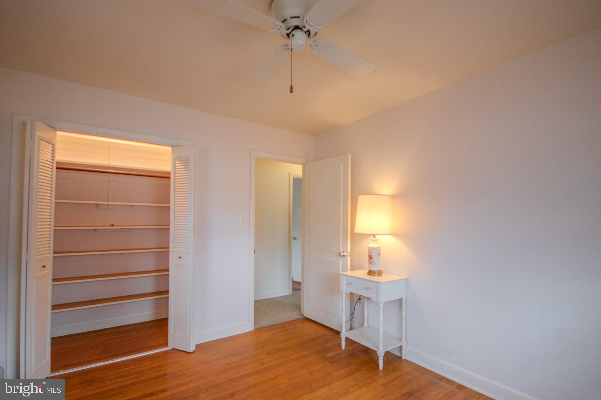 633 Ridge Road Salisbury, MD 21801 - Photo 30 of 45 a view of empty room with wooden floor and fan
