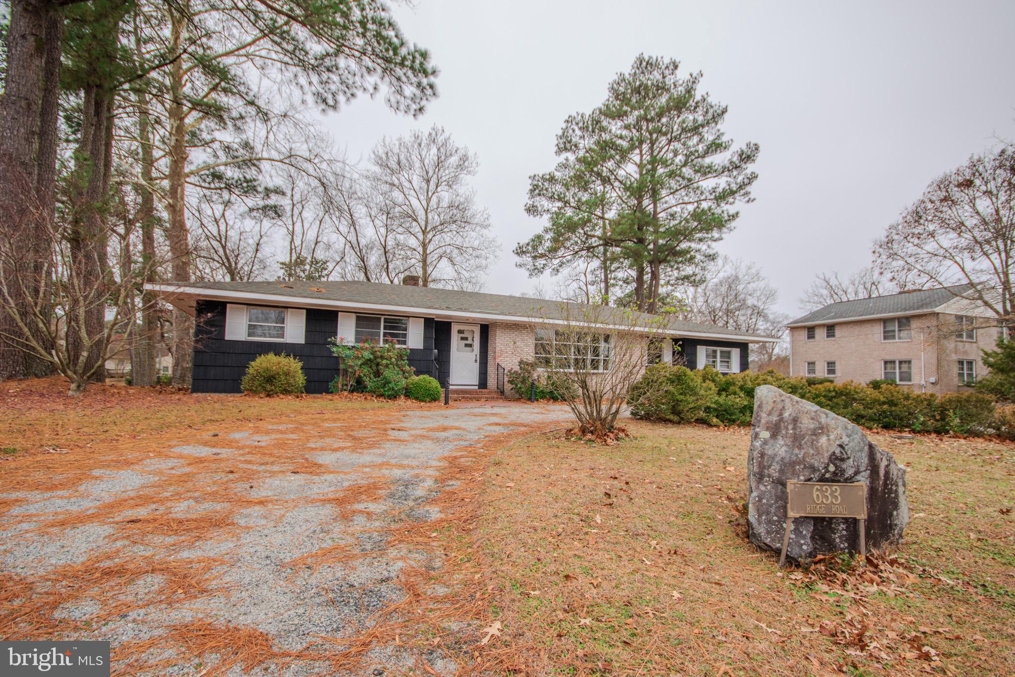 633 Ridge Road Salisbury, MD 21801 - Photo 4 of 45 a front view of a house with a yard and seating space