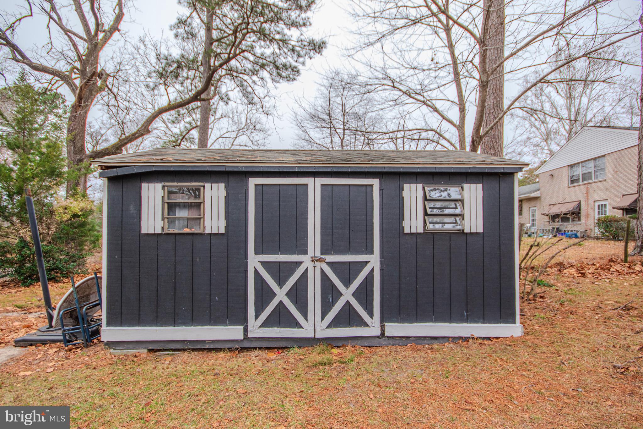 633 Ridge Road Salisbury, MD 21801 - Photo 45 of 45 a house with trees in front of it