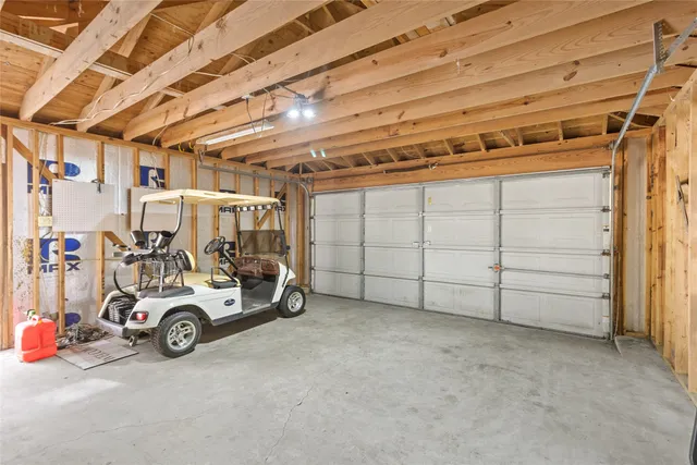 a view of a garage with storage