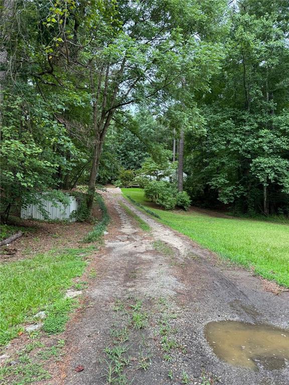 7800 Cedar Grove Road Fairburn, GA 30213 - Photo 1 of 1 a view of a backyard