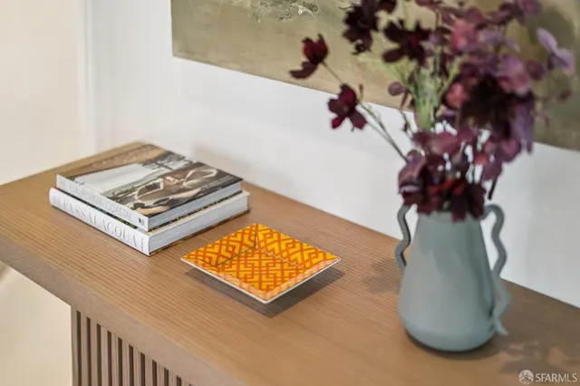 a vase of flowers sitting on a table