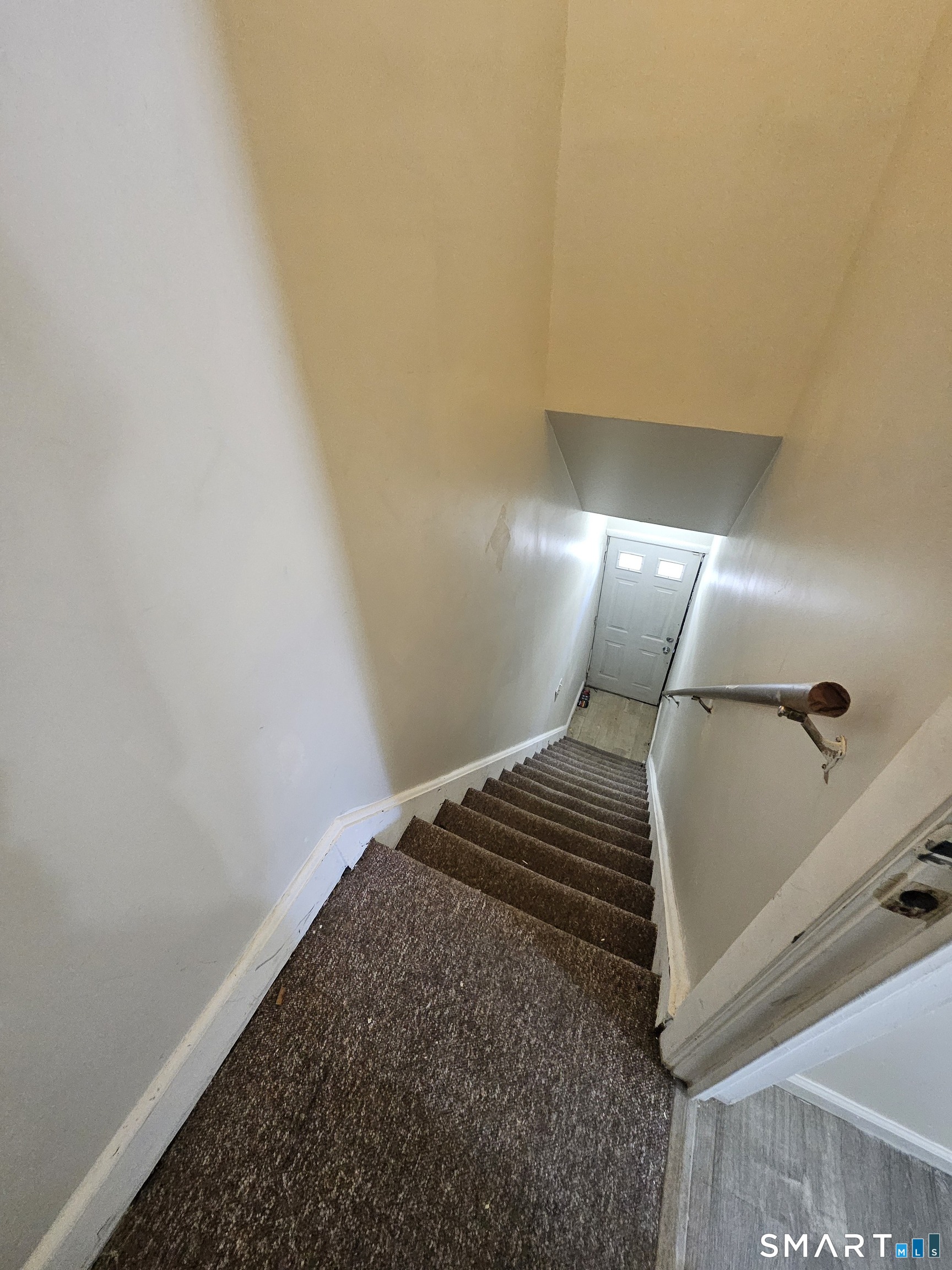 236 Brooks Street, Unit 236 Bridgeport, CT 06608 - Photo 8 of 12 a view of staircase with rug
