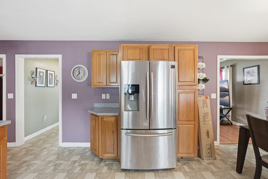 19 Annies Way Springfield, MA 01119 - Photo 13 of 40 a kitchen with stainless steel appliances granite countertop a refrigerator and a stove top oven
