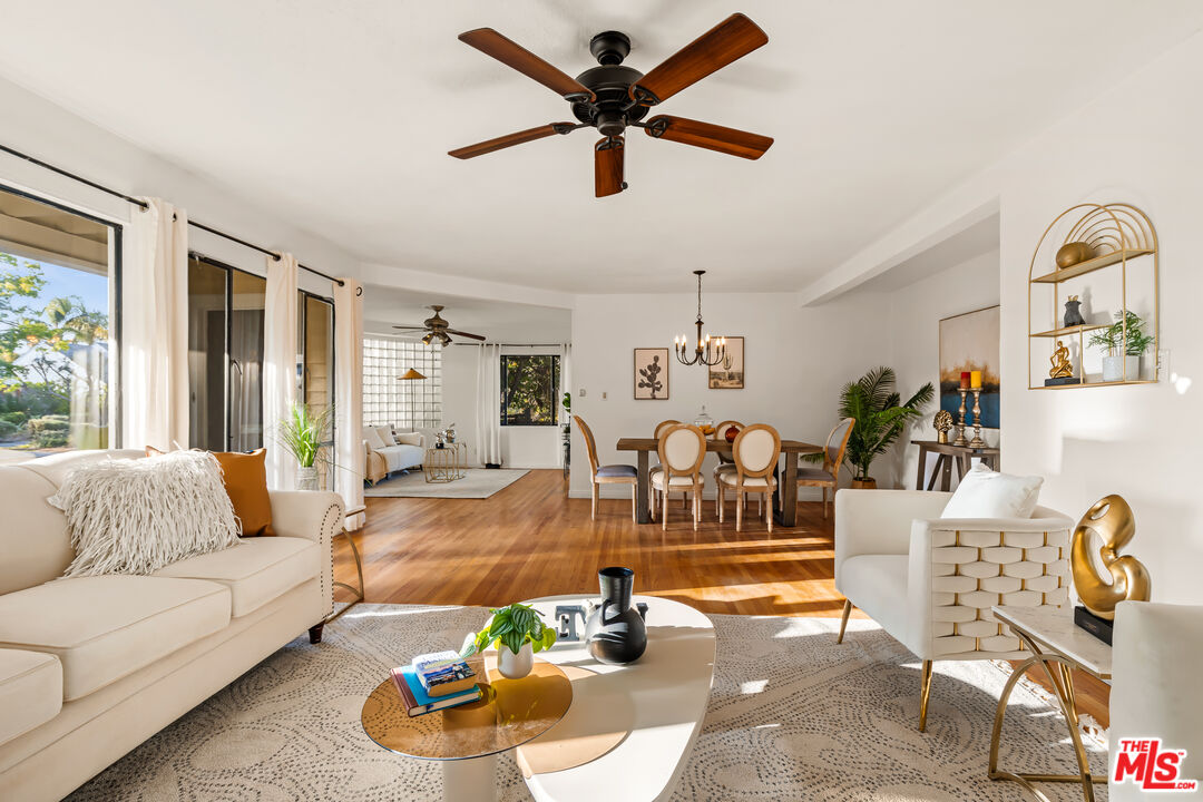 1100 Victoria Avenue Venice, CA 90291 - Photo 7 of 30 a living room with furniture and a wooden floor