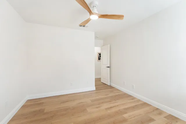 a view of a backyard of the house