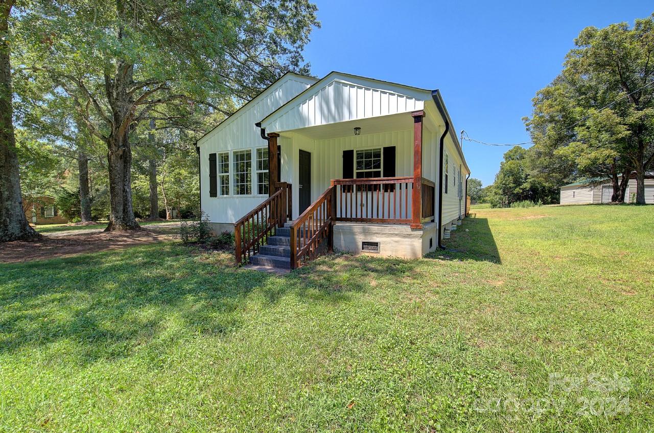 6130 Hopewell Road Hickory Grove, SC 29717 - Photo 1 of 29 a front view of a house with a yard