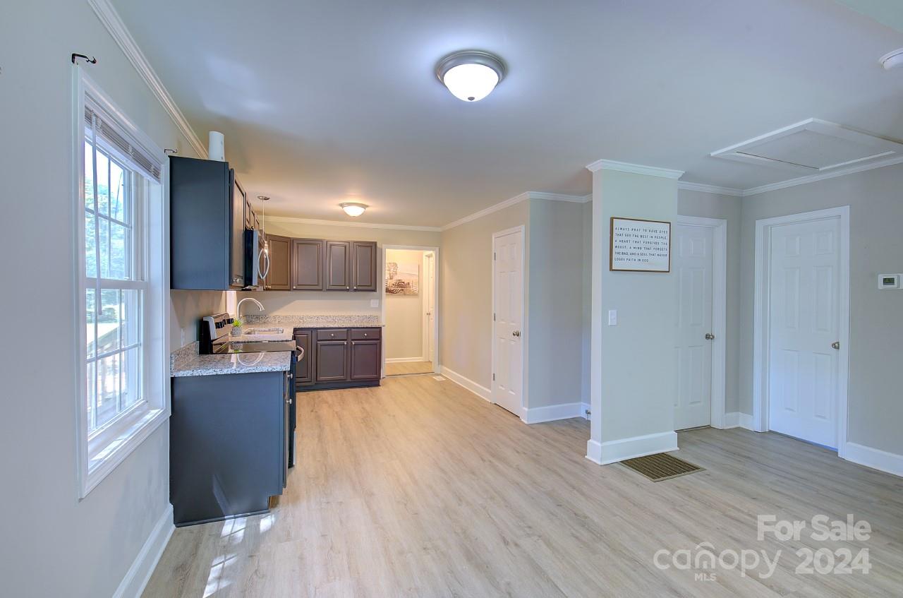 6130 Hopewell Road Hickory Grove, SC 29717 - Photo 14 of 29 a view of a kitchen with a sink cabinets and a window