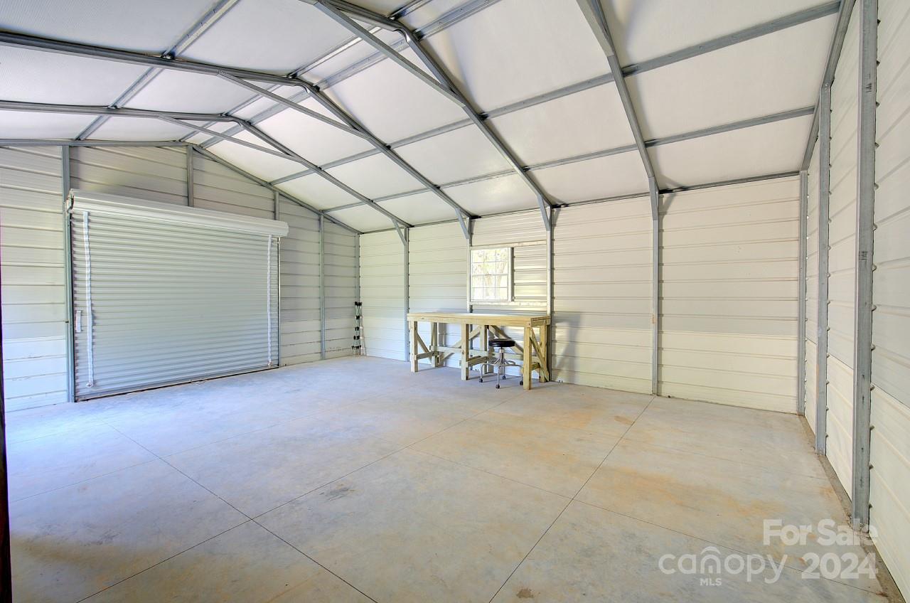 6130 Hopewell Road Hickory Grove, SC 29717 - Photo 27 of 29 a view of a room with furniture and white walls