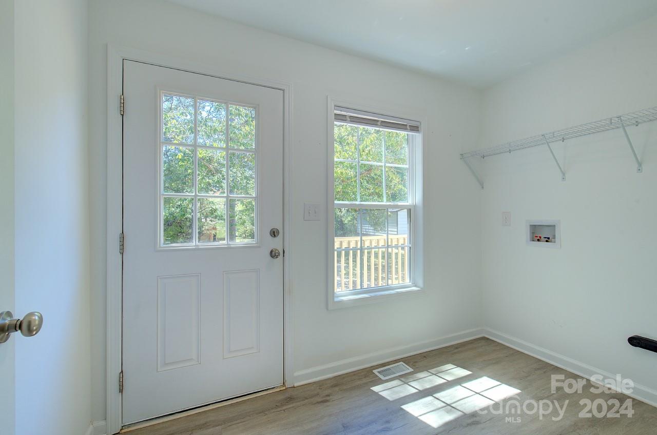 6130 Hopewell Road Hickory Grove, SC 29717 - Photo 9 of 29 a view of room with window and hardwood floor