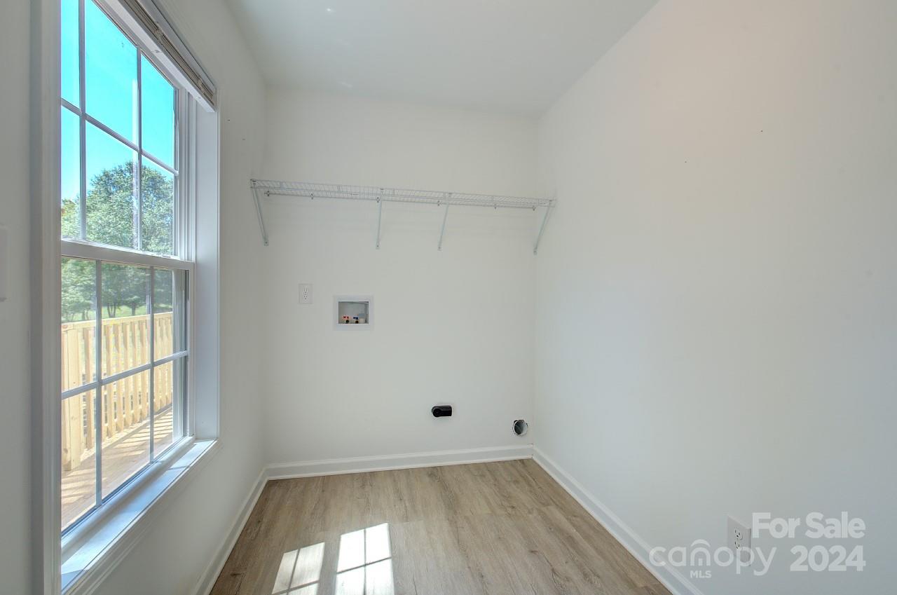 6130 Hopewell Road Hickory Grove, SC 29717 - Photo 10 of 29 a view of a small space with wooden floor and a window