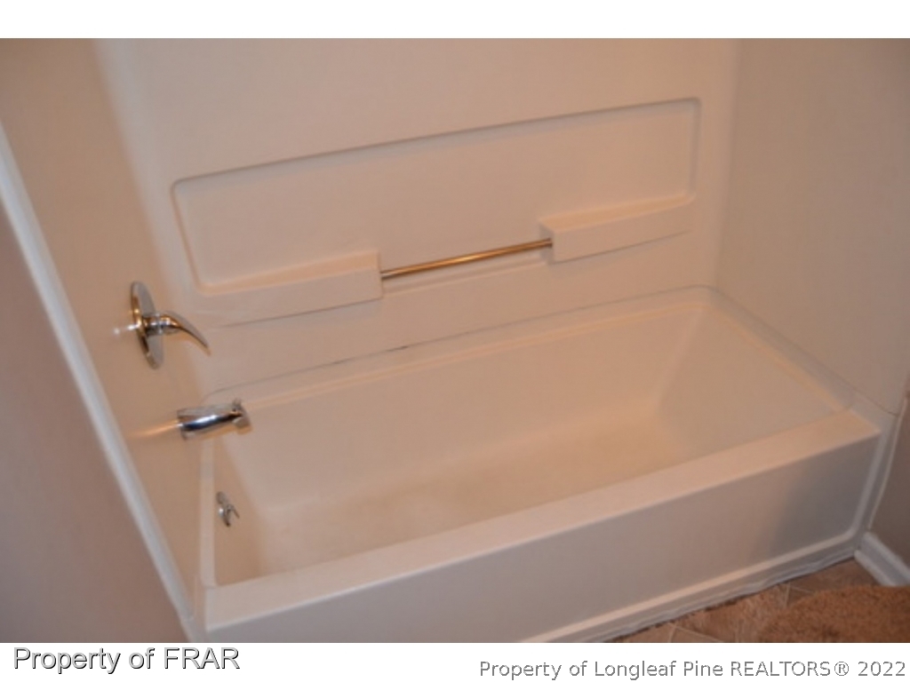 3326 Annawood Court Spring Lake, NC 28390 - Photo 14 of 19 a bathroom with a bathtub