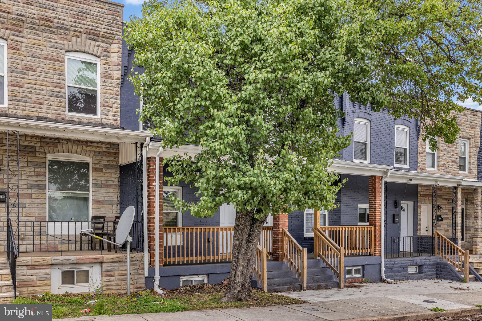 1622 Hazel Street Baltimore, MD 21226 - Photo 29 of 40 Charming row homes with lush greenery.