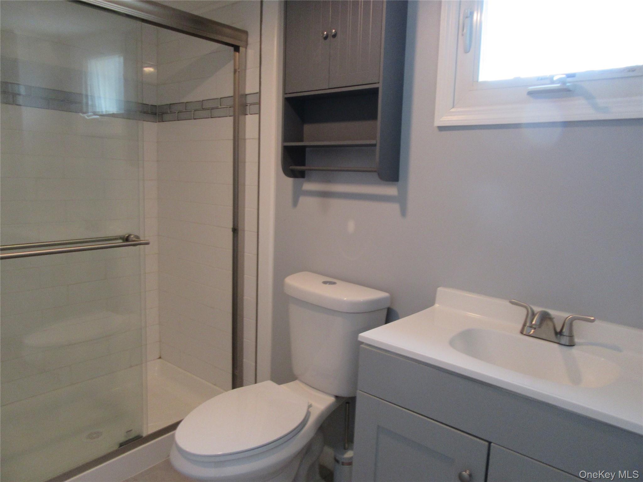 13 West Main Street, Unit 2A Washingtonville, NY 10992 - Photo 12 of 13 Full bathroom featuring a shower stall and vanity