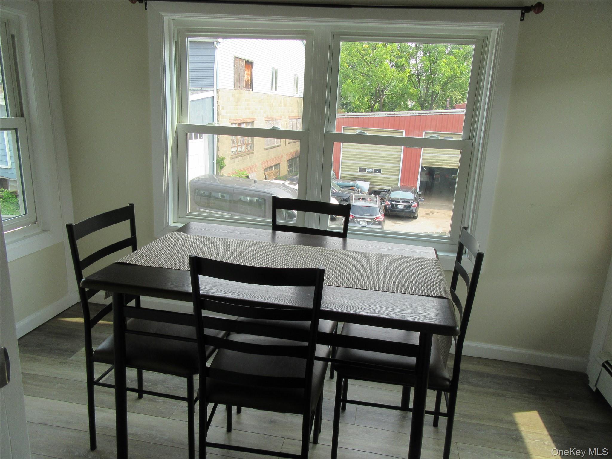 13 West Main Street, Unit 2A Washingtonville, NY 10992 - Photo 8 of 13 Dining area featuring baseboards and wood finished floors