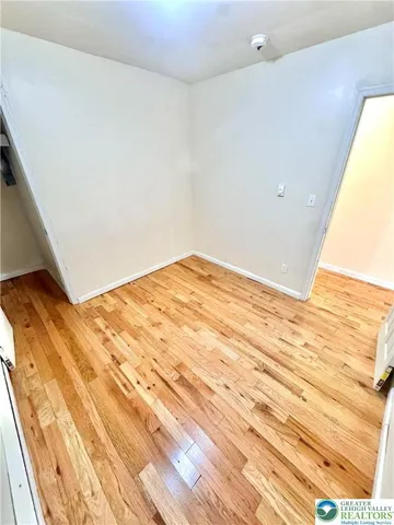 a view of a big room with wooden floor