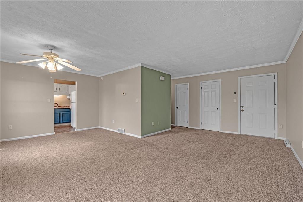 661 Georgetown Village Indiana, PA 15701 - Photo 13 of 25 a view of an empty room with a chandelier fan