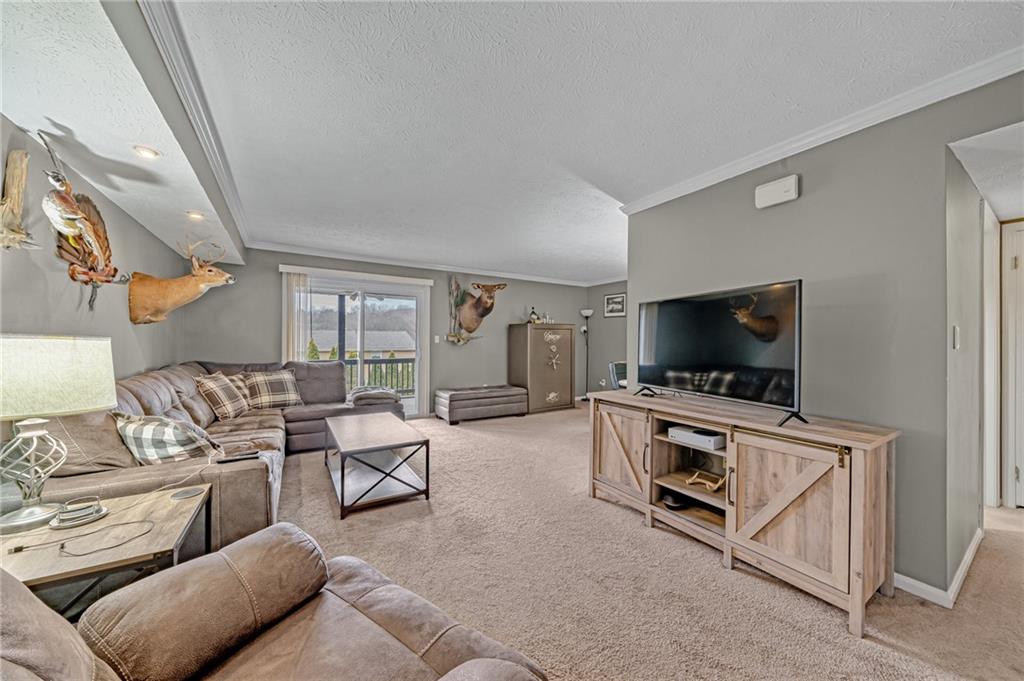 661 Georgetown Village Indiana, PA 15701 - Photo 2 of 25 a living room with furniture and a flat screen tv