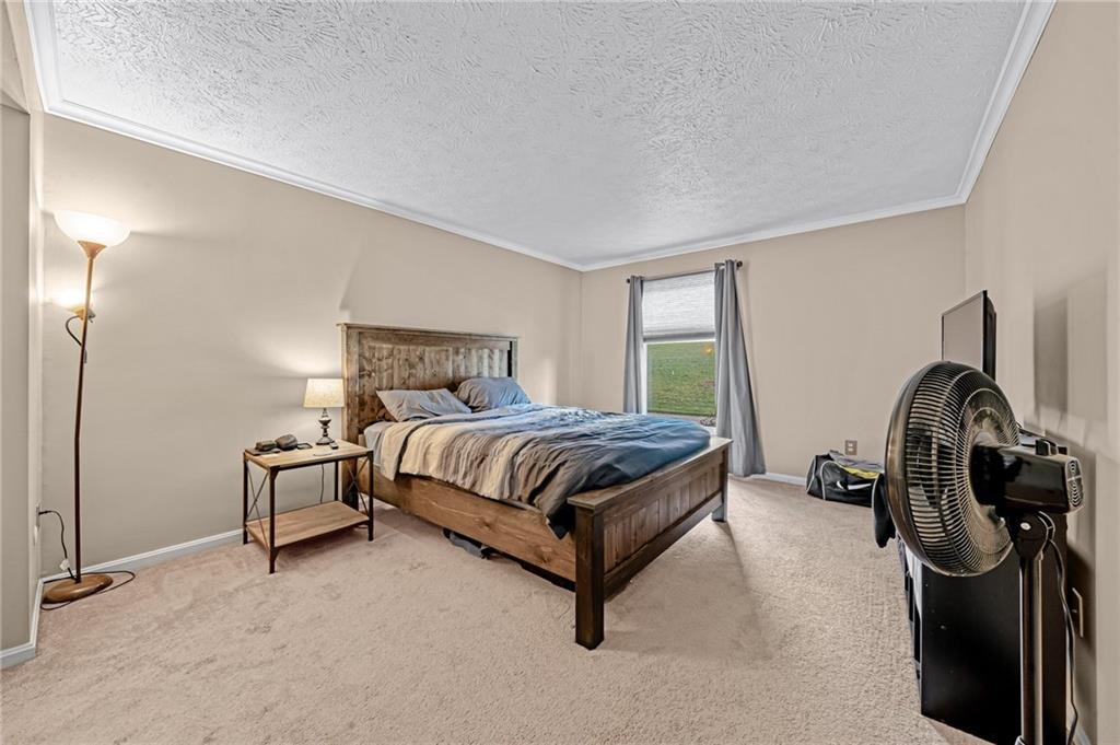 661 Georgetown Village Indiana, PA 15701 - Photo 7 of 25 a bedroom with a bed and a window