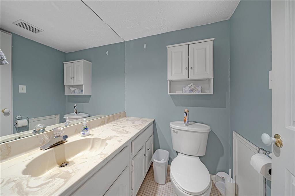 661 Georgetown Village Indiana, PA 15701 - Photo 9 of 25 a bathroom with a sink toilet and a mirror