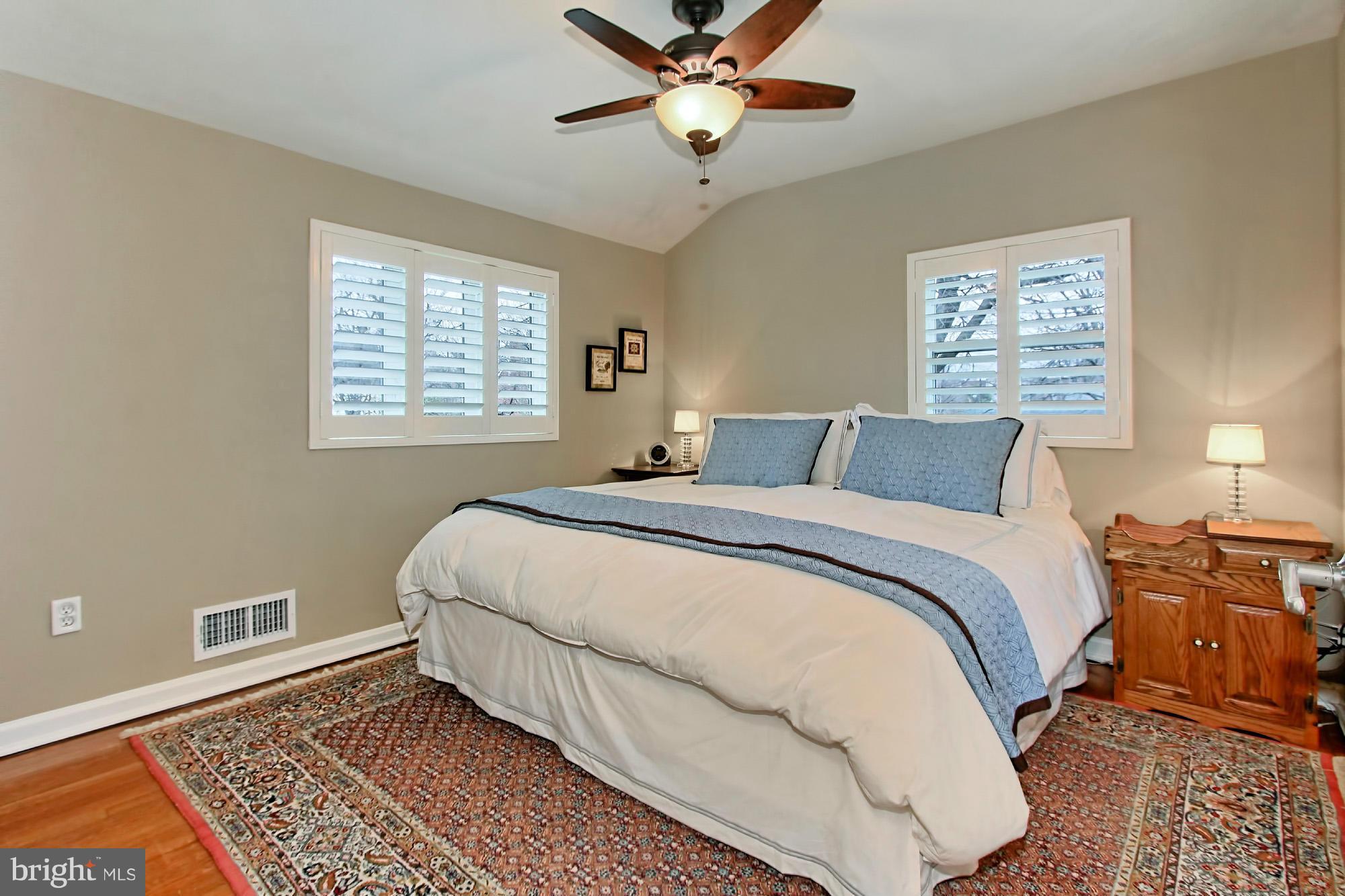 216 East Spring Street Alexandria, VA 22301 - Photo 12 of 30 Master bedroom with wood floors and large windows