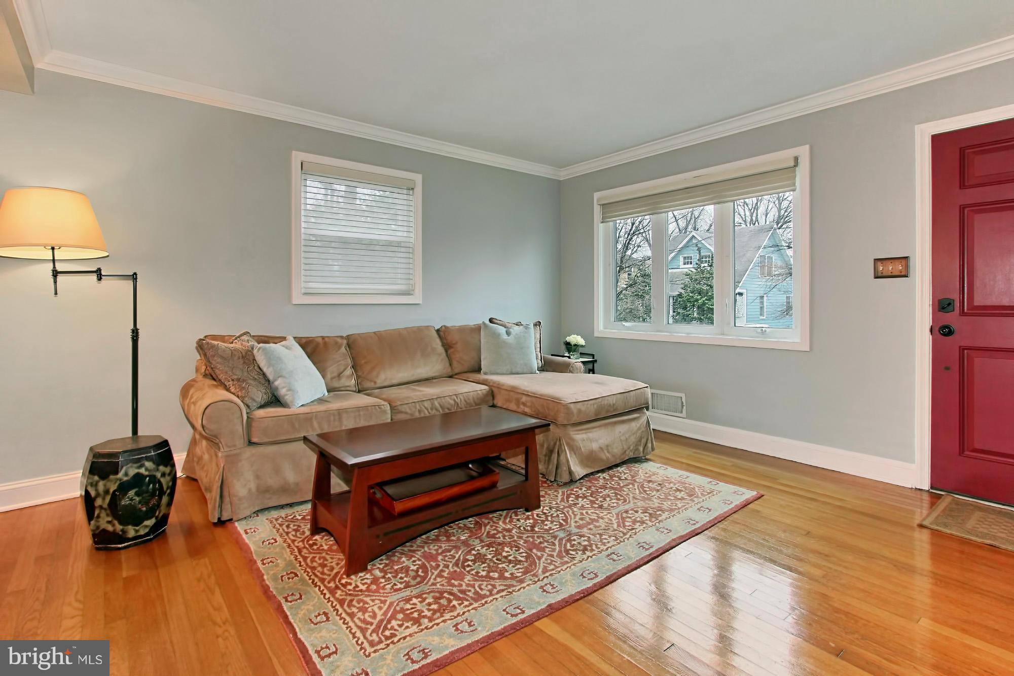 216 East Spring Street Alexandria, VA 22301 - Photo 3 of 30 Large windows all around give great natural light
