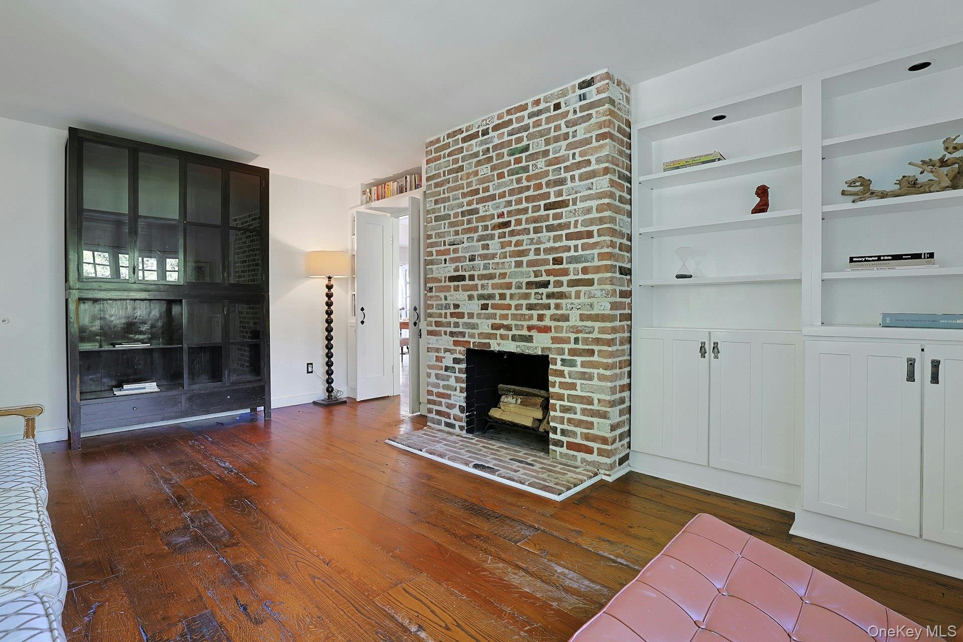 65 Douglas Road Chappaqua, NY 10514 - Photo 9 of 41 The living room flows effortlessly into the family room and dining areas, creating an open setting that feels equally suited for everyday living and effortless entertaining.