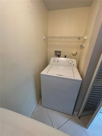 a utility room with a sink
