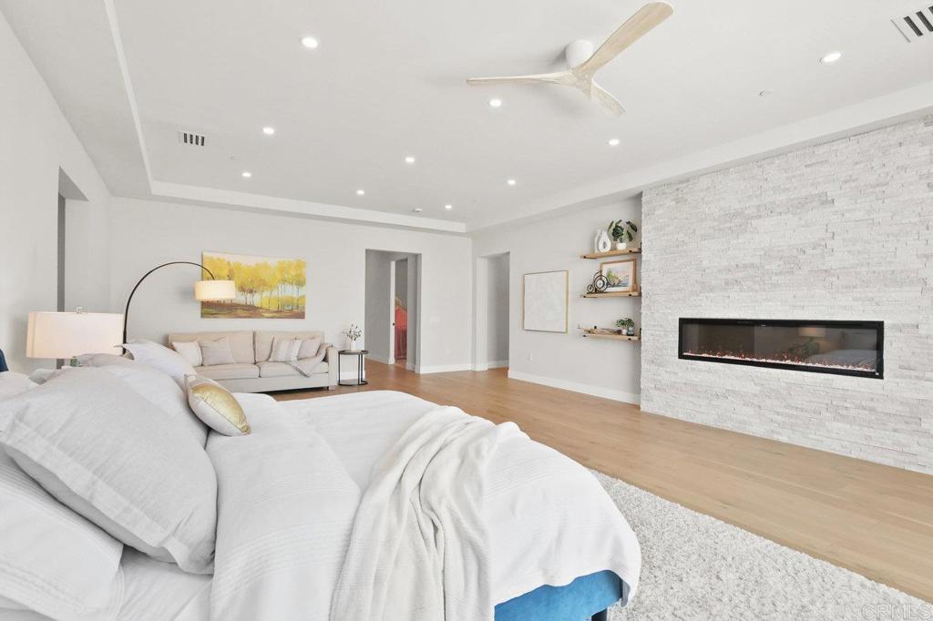 573 Lilac Ranch Road Alpine, CA 91901 - Photo 15 of 47 a bedroom with a bed and a flat screen tv