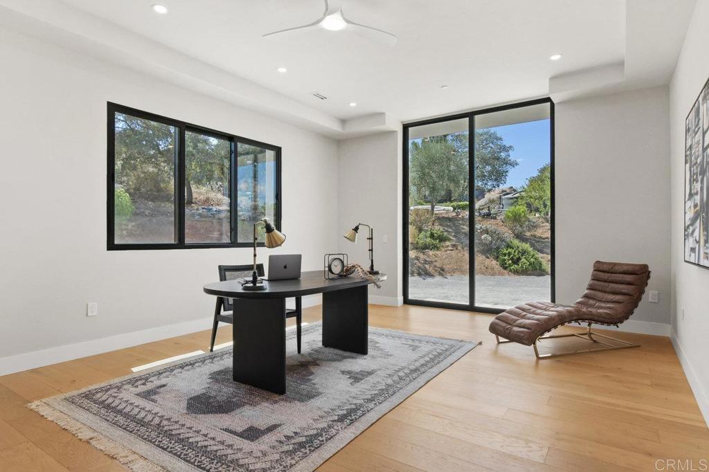 573 Lilac Ranch Road Alpine, CA 91901 - Photo 21 of 47 a living room with furniture and large windows