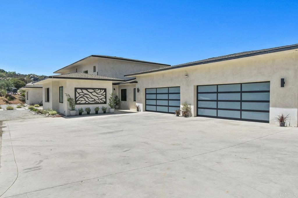 573 Lilac Ranch Road Alpine, CA 91901 - Photo 30 of 47 a view of a house with a garage