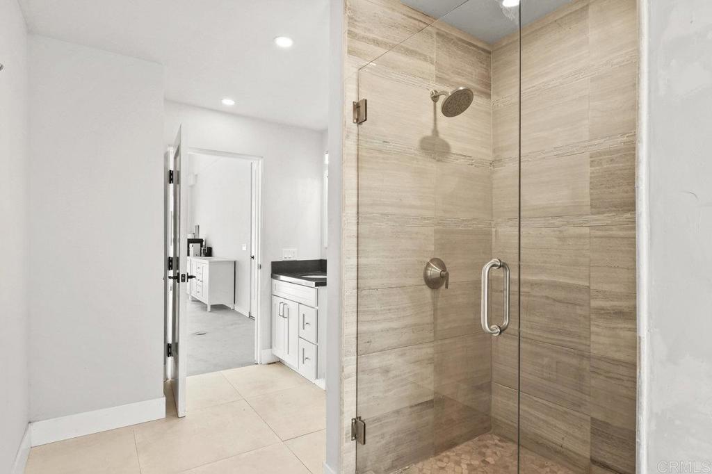 573 Lilac Ranch Road Alpine, CA 91901 - Photo 33 of 47 a bathroom with a shower and a sink