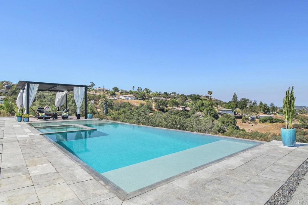 573 Lilac Ranch Road Alpine, CA 91901 - Photo 40 of 47 a view of a swimming pool and an outdoor seating