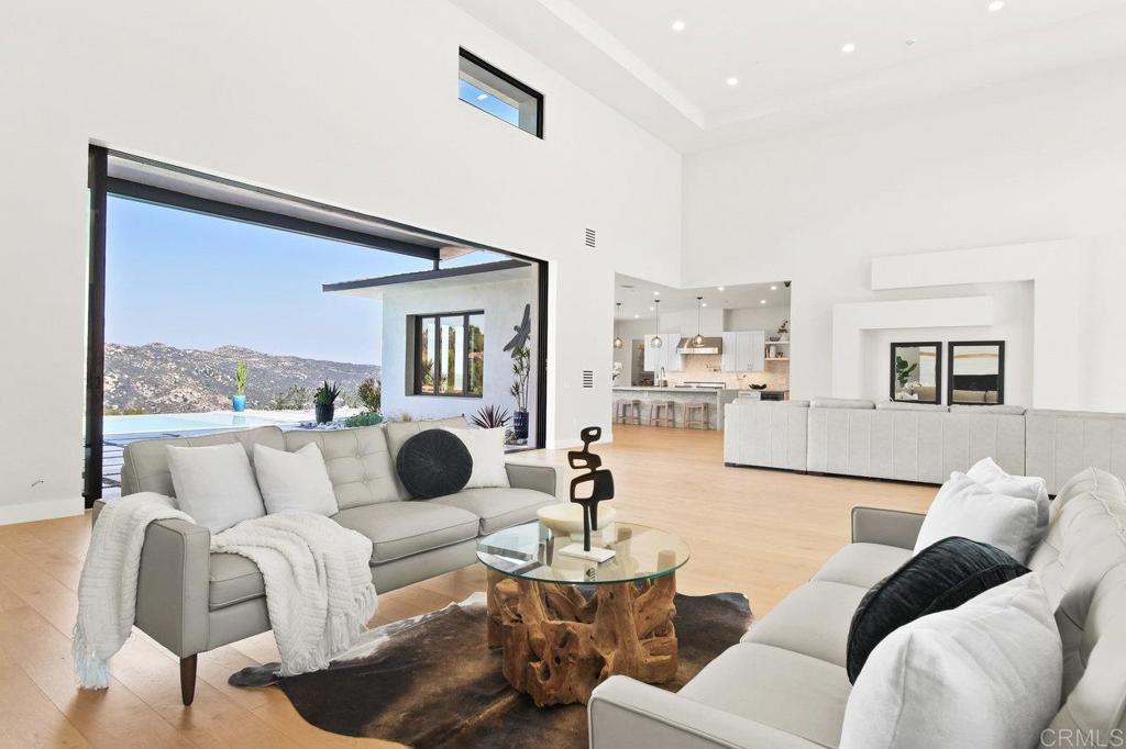 573 Lilac Ranch Road Alpine, CA 91901 - Photo 4 of 47 a living room with furniture and a large window