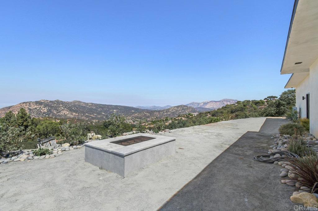 573 Lilac Ranch Road Alpine, CA 91901 - Photo 41 of 47 a view of a terrace with a bench