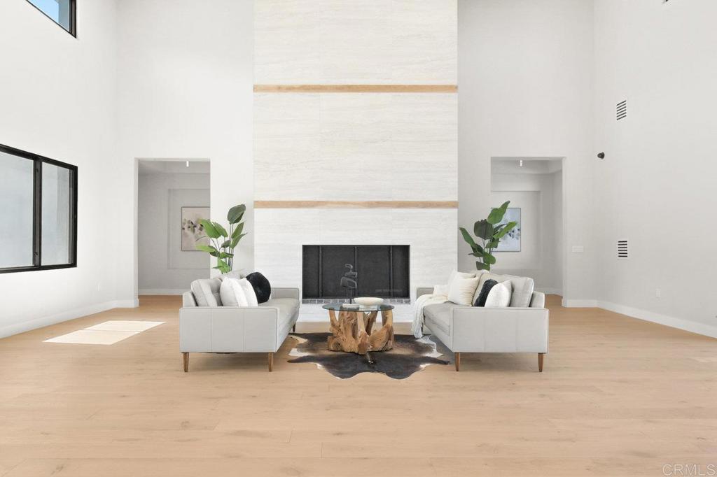 573 Lilac Ranch Road Alpine, CA 91901 - Photo 6 of 47 a living room with furniture and a fireplace