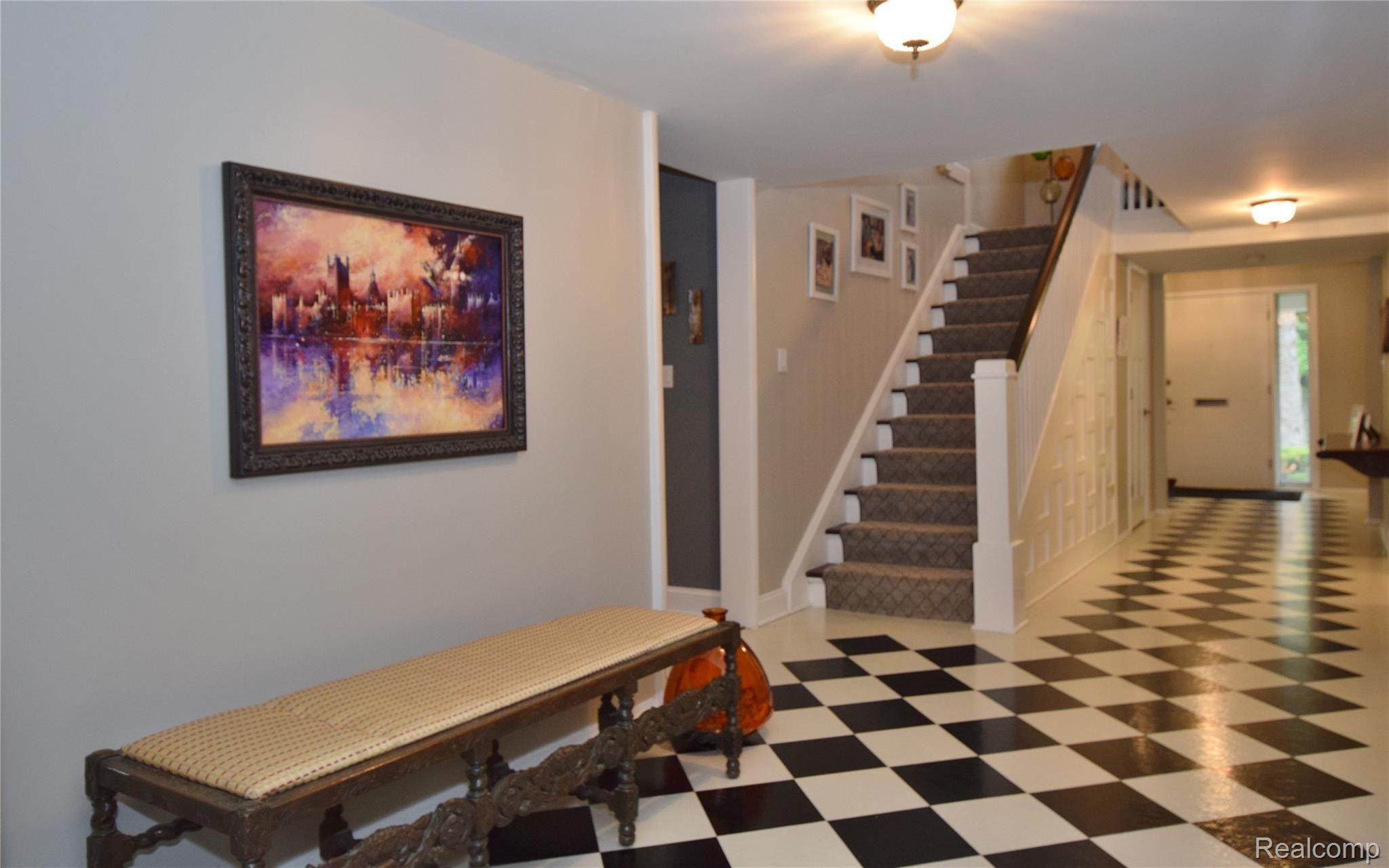 1331 West Maple Road Birmingham, MI 48009 - Photo 19 of 43 View thru front hall to stairway