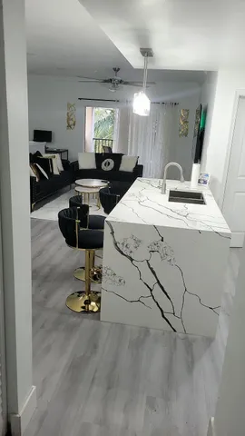 a room with a bed and gym equipment